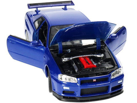 Skyline GT-R (R34) RHD (Right Hand Drive) Blue Metallic NEX Models 1/24 Diecast Model Car by Welly 24108