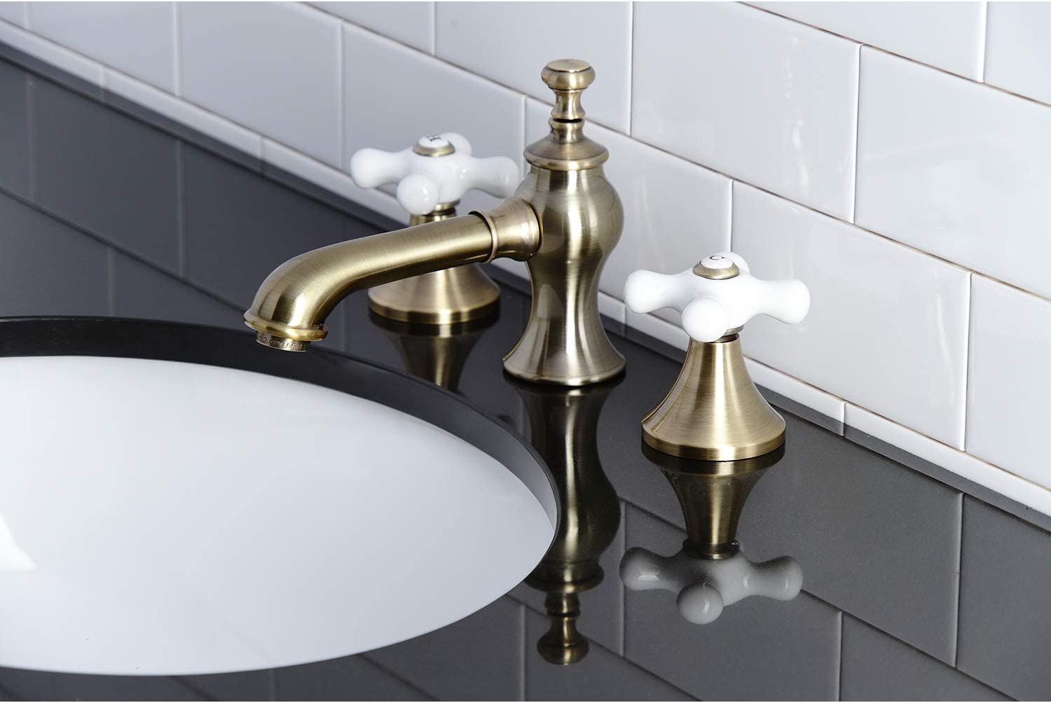 Kingston Brass KC7063PX Vintage 8 in. Widespread Bathroom Faucet, Antique Brass