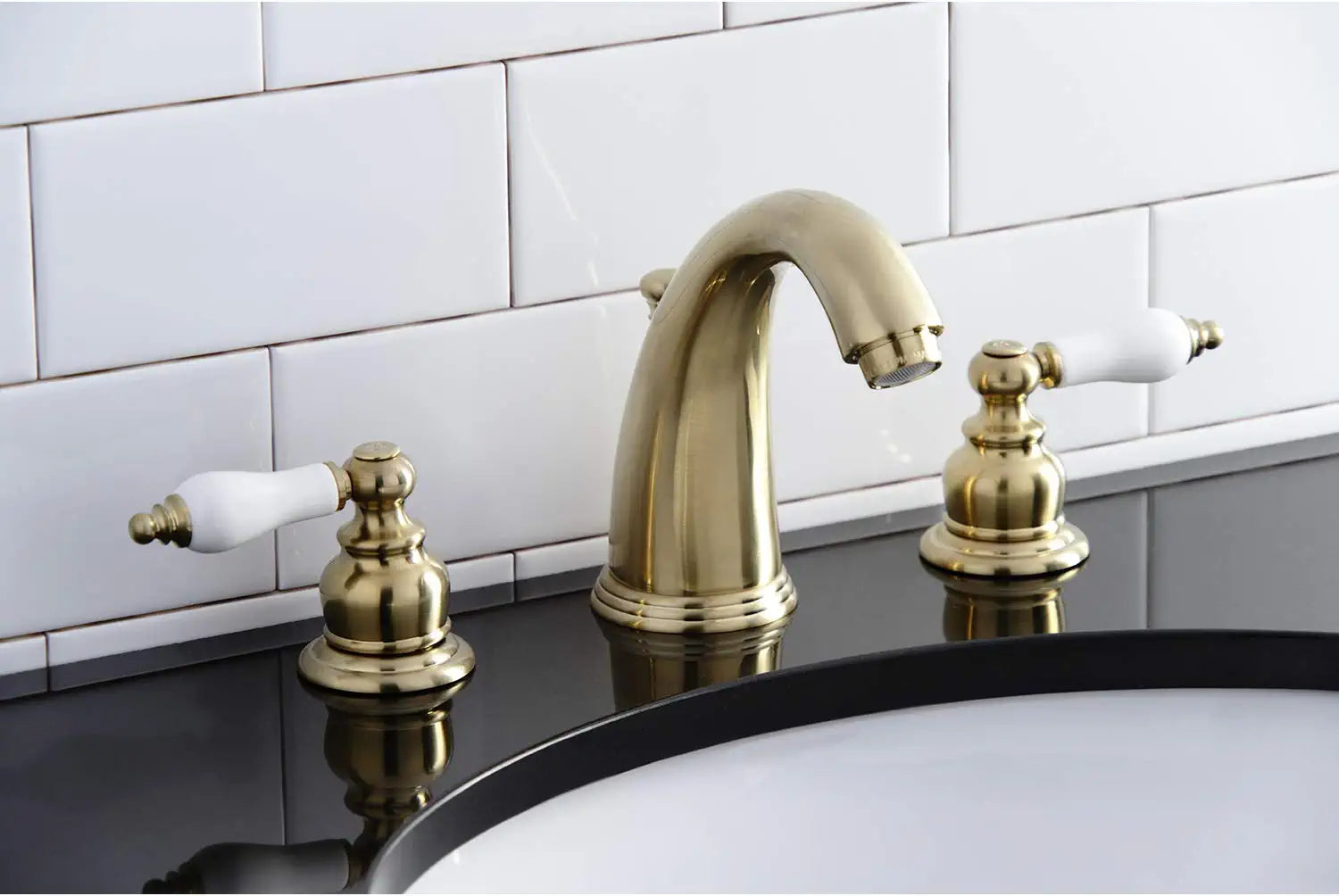 Kingston Brass KB987PLSB Victorian 2-Handle 8 in. Widespread Bathroom Faucet, Brushed Brass