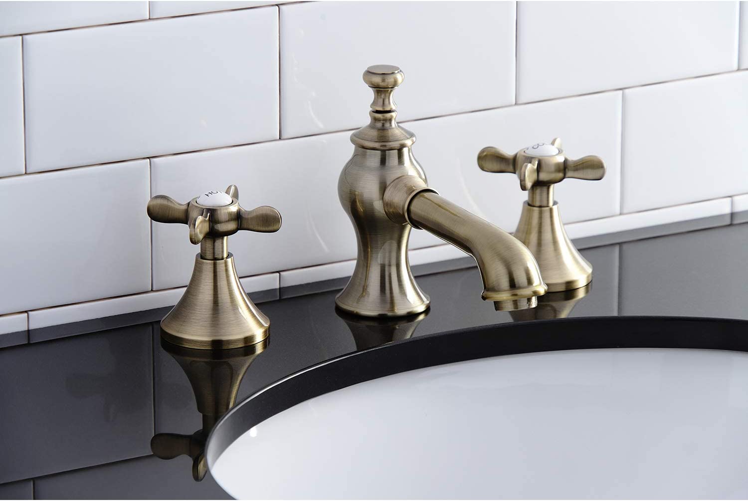 Kingston Brass KC7063BEX Essex 8 in. Widespread Bathroom Faucet, Antique Brass