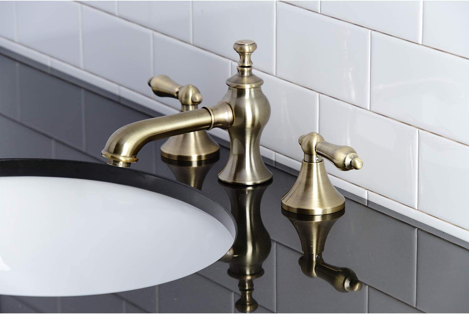 Kingston Brass KC7063AL Vintage 8 in. Widespread Bathroom Faucet, Antique Brass