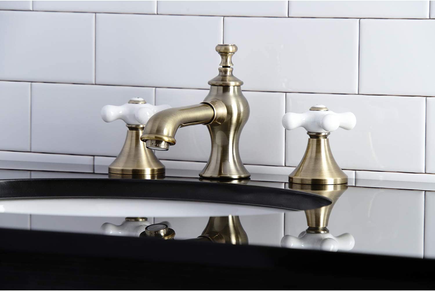 Kingston Brass KC7063PX Vintage 8 in. Widespread Bathroom Faucet, Antique Brass