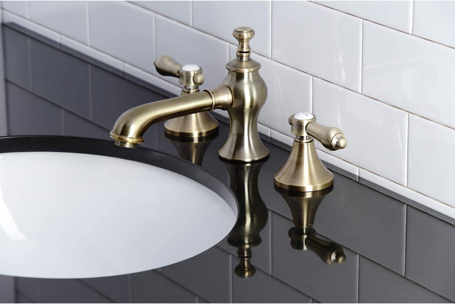 Kingston Brass KC7063BAL Heirloom 8 in. Widespread Bathroom Faucet, Antique Brass