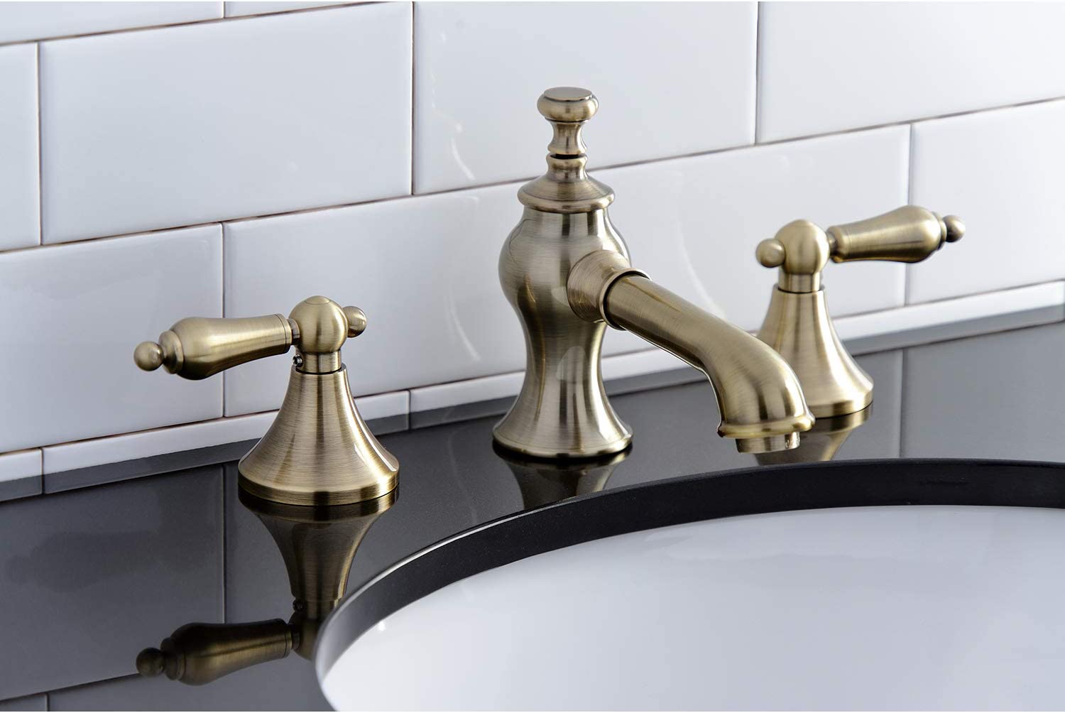 Kingston Brass KC7063AL Vintage 8 in. Widespread Bathroom Faucet, Antique Brass