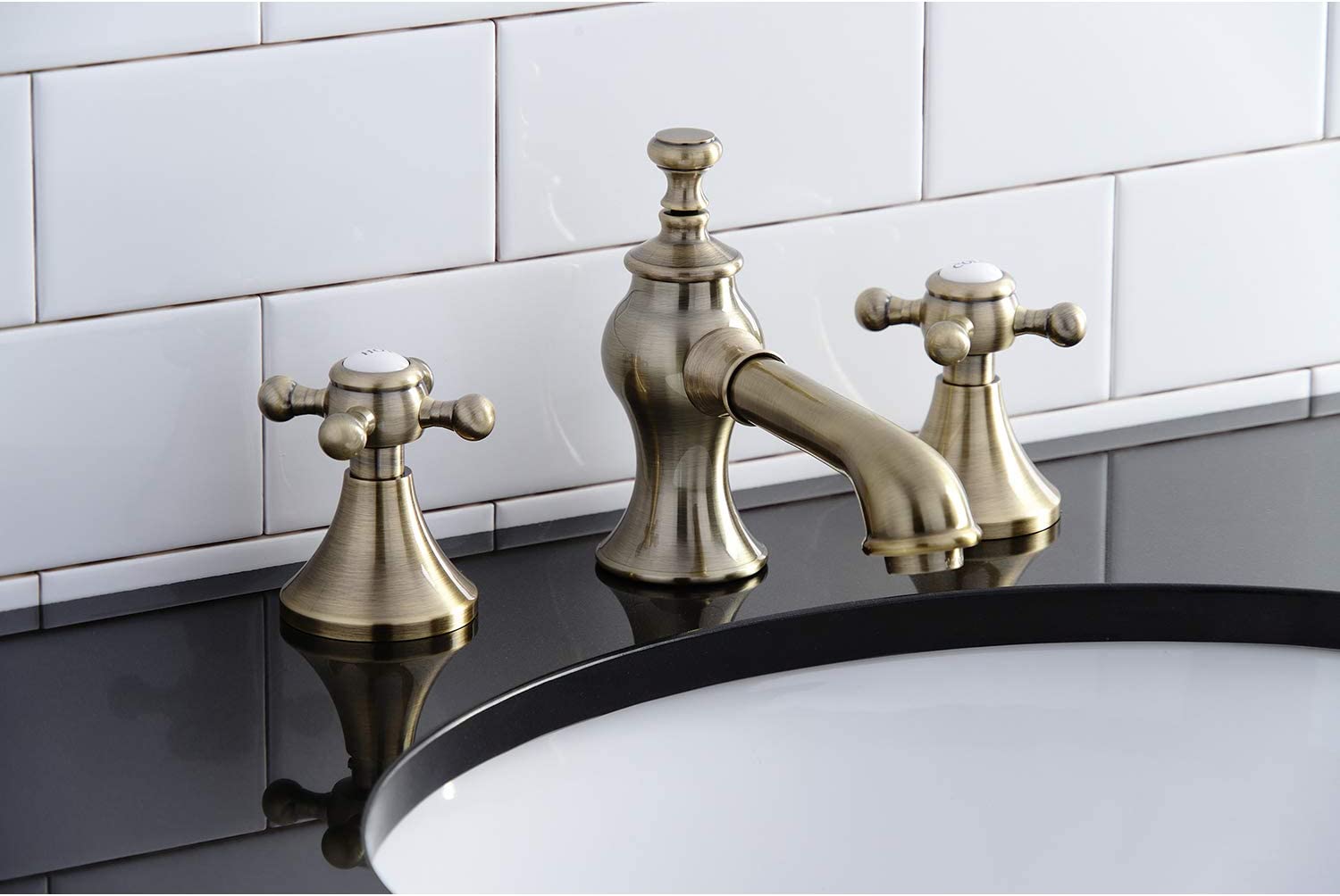 Kingston Brass KC7063BX English Country 8 in. Widespread Bathroom Faucet, Antique Brass