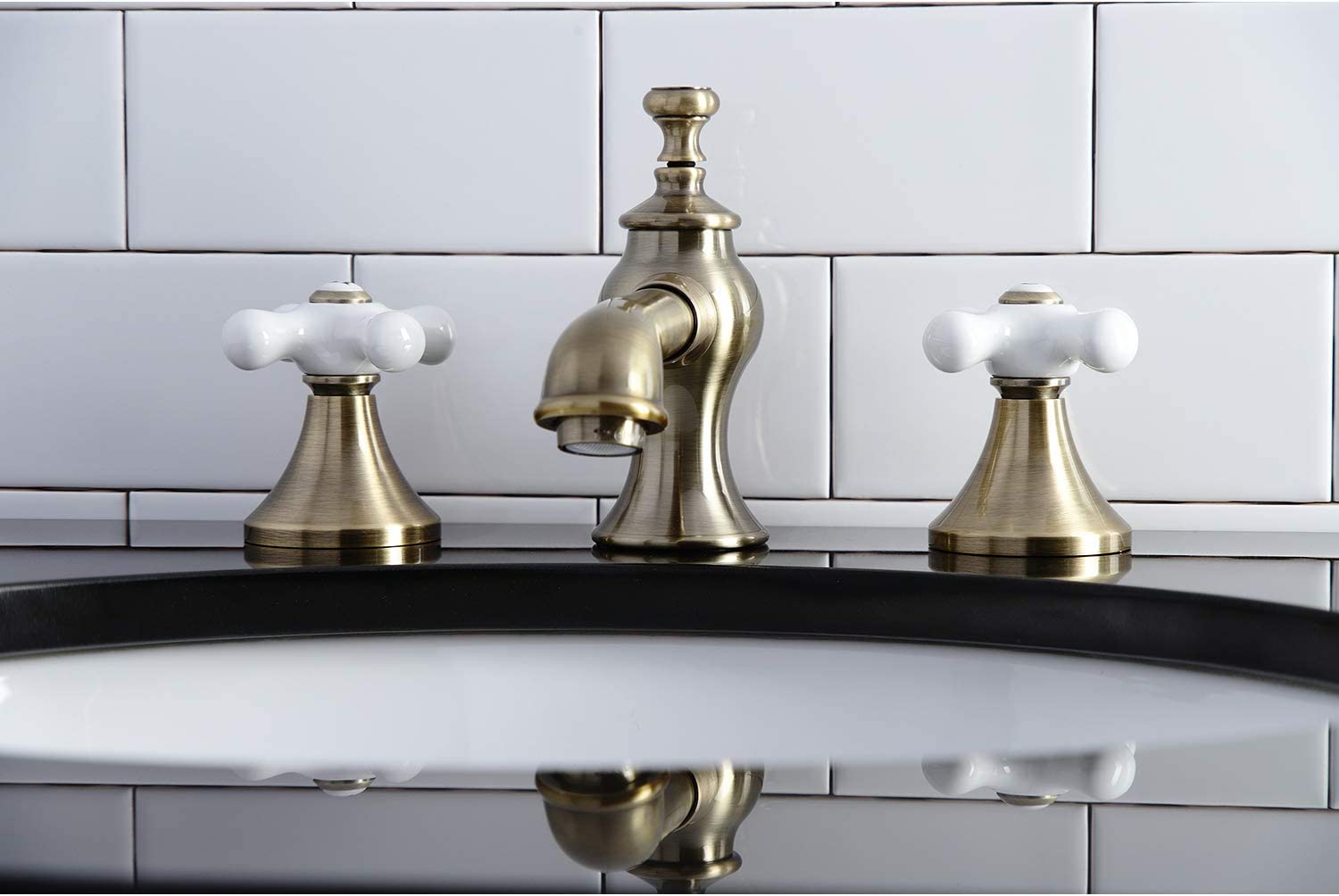 Kingston Brass KC7063PX Vintage 8 in. Widespread Bathroom Faucet, Antique Brass