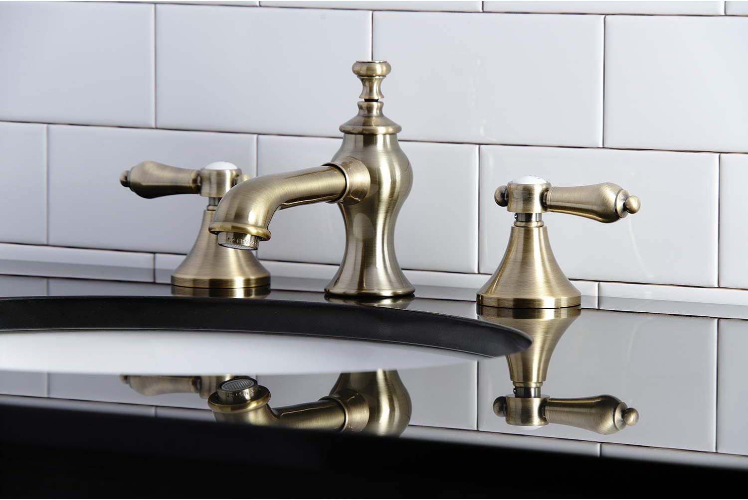 Kingston Brass KC7063BAL Heirloom 8 in. Widespread Bathroom Faucet, Antique Brass