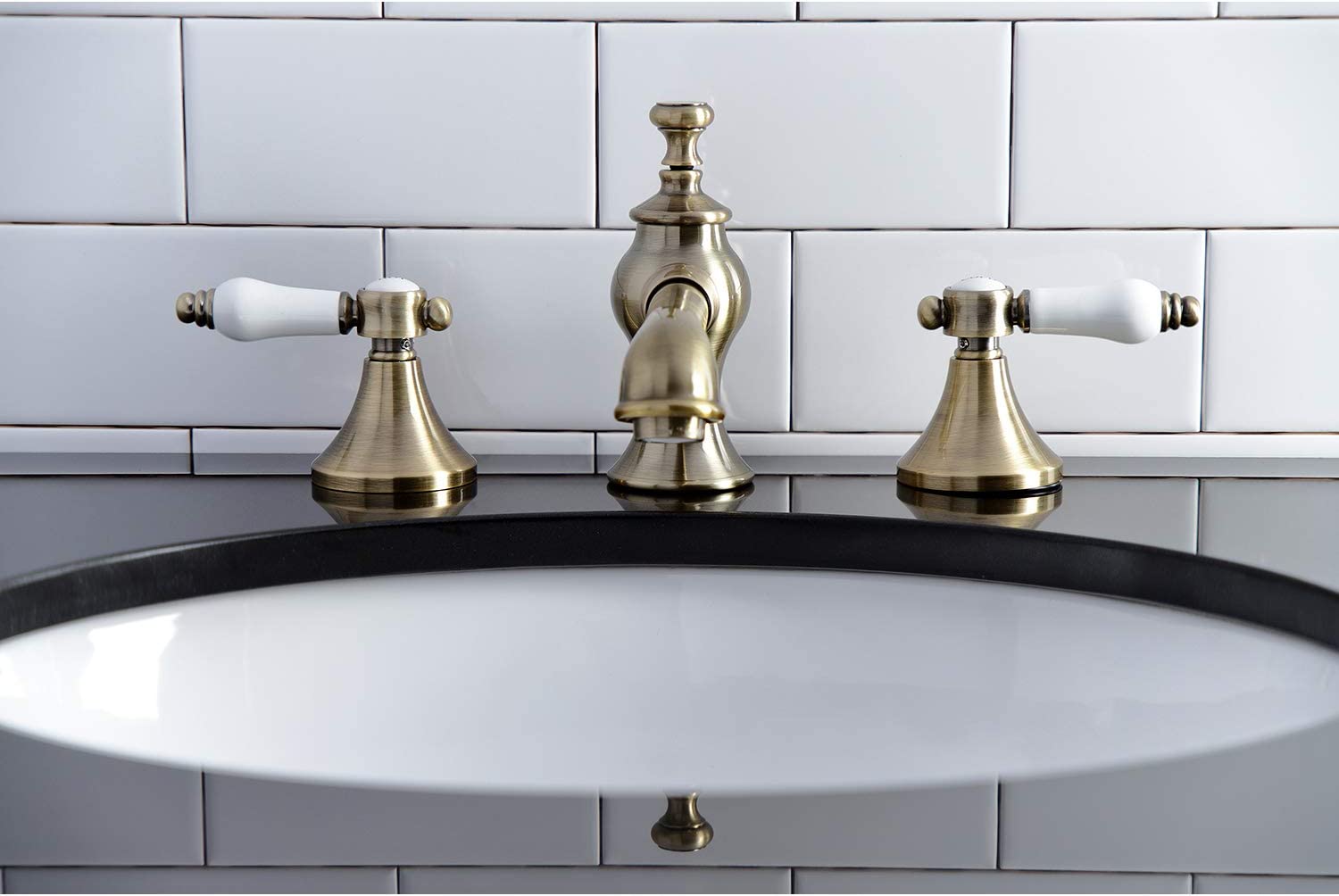 Kingston Brass KC7063BPL Bel-Air 8 in. Widespread Bathroom Faucet, Antique Brass