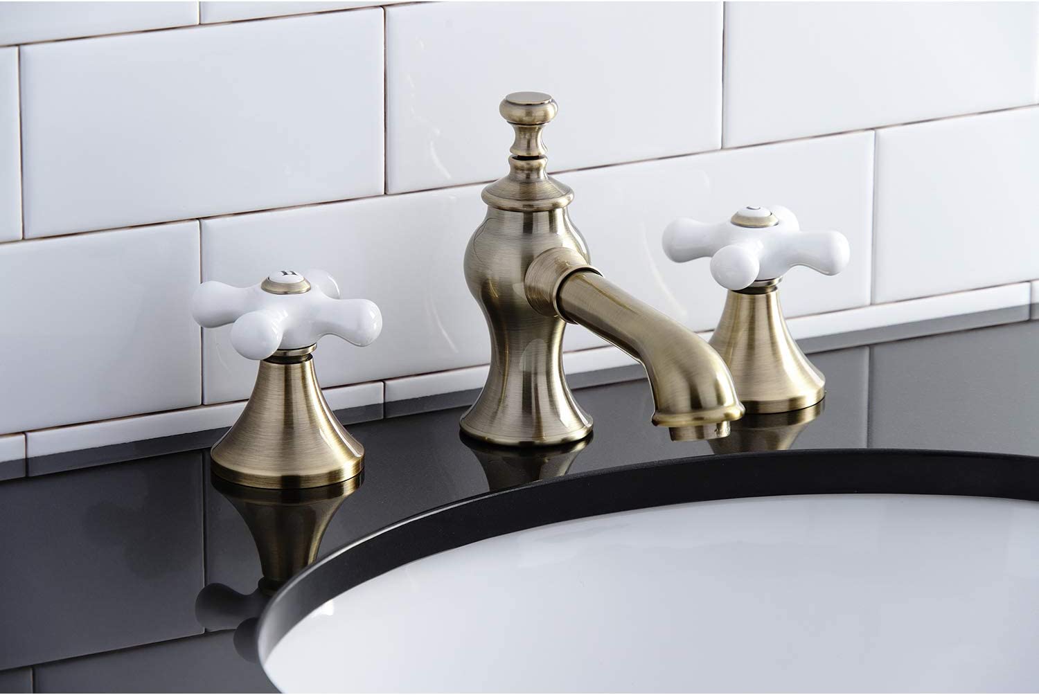 Kingston Brass KC7063PX Vintage 8 in. Widespread Bathroom Faucet, Antique Brass