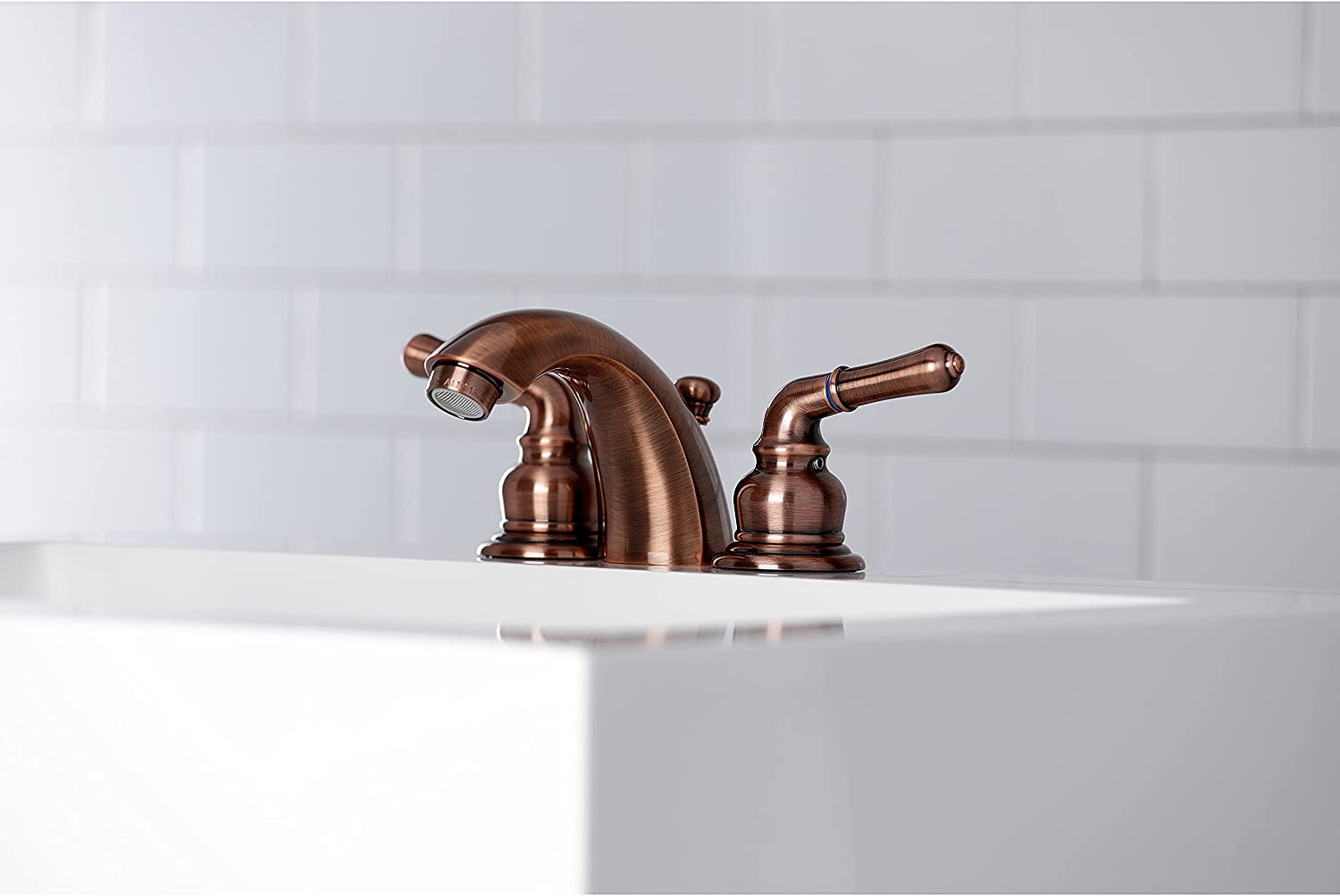 Kingston Brass KB956 Magellan Mini-Widespread Bathroom Faucet, Antique Copper