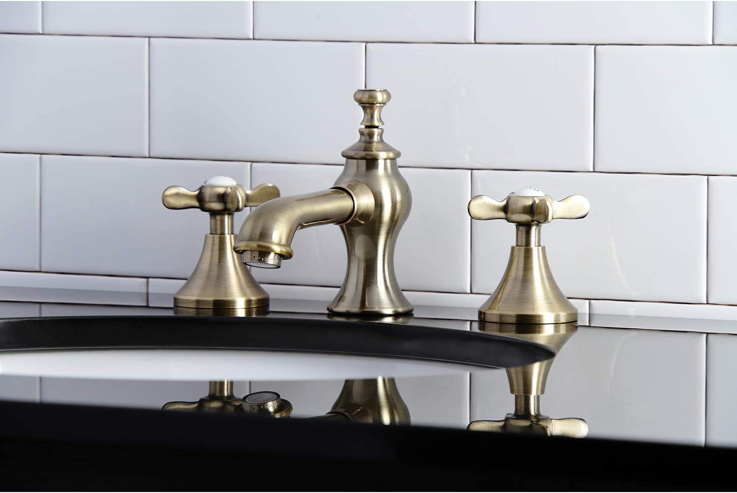 Kingston Brass KC7063BEX Essex 8 in. Widespread Bathroom Faucet, Antique Brass