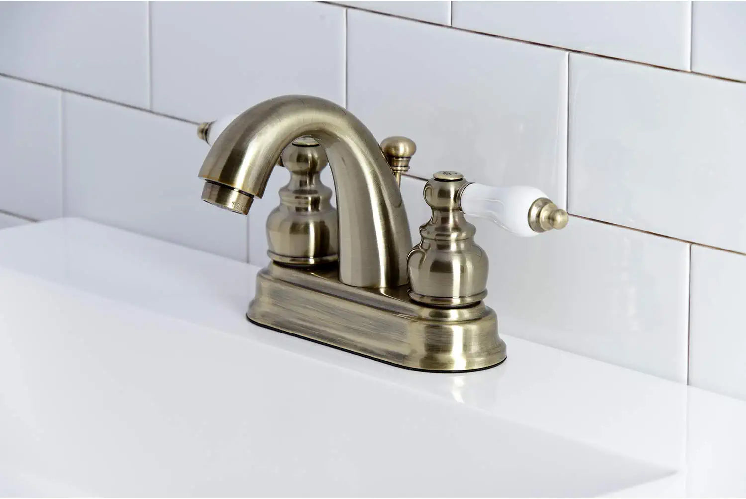 Kingston Brass KB5613PL Restoration 4-Inch Centerset Bathroom Faucet, Antique Brass