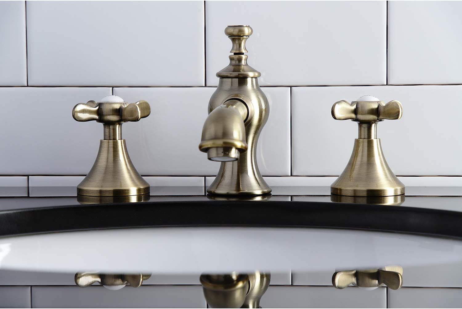 Kingston Brass KC7063BEX Essex 8 in. Widespread Bathroom Faucet, Antique Brass