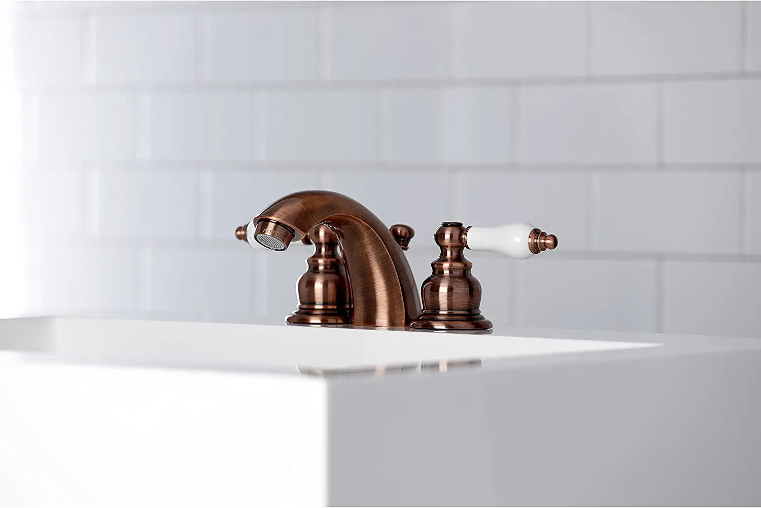 Kingston Brass KB956PL Victorian Mini-Widespread Bathroom Faucet, Antique Copper