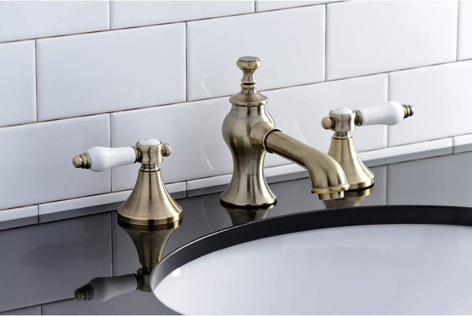 Kingston Brass KC7063BPL Bel-Air 8 in. Widespread Bathroom Faucet, Antique Brass