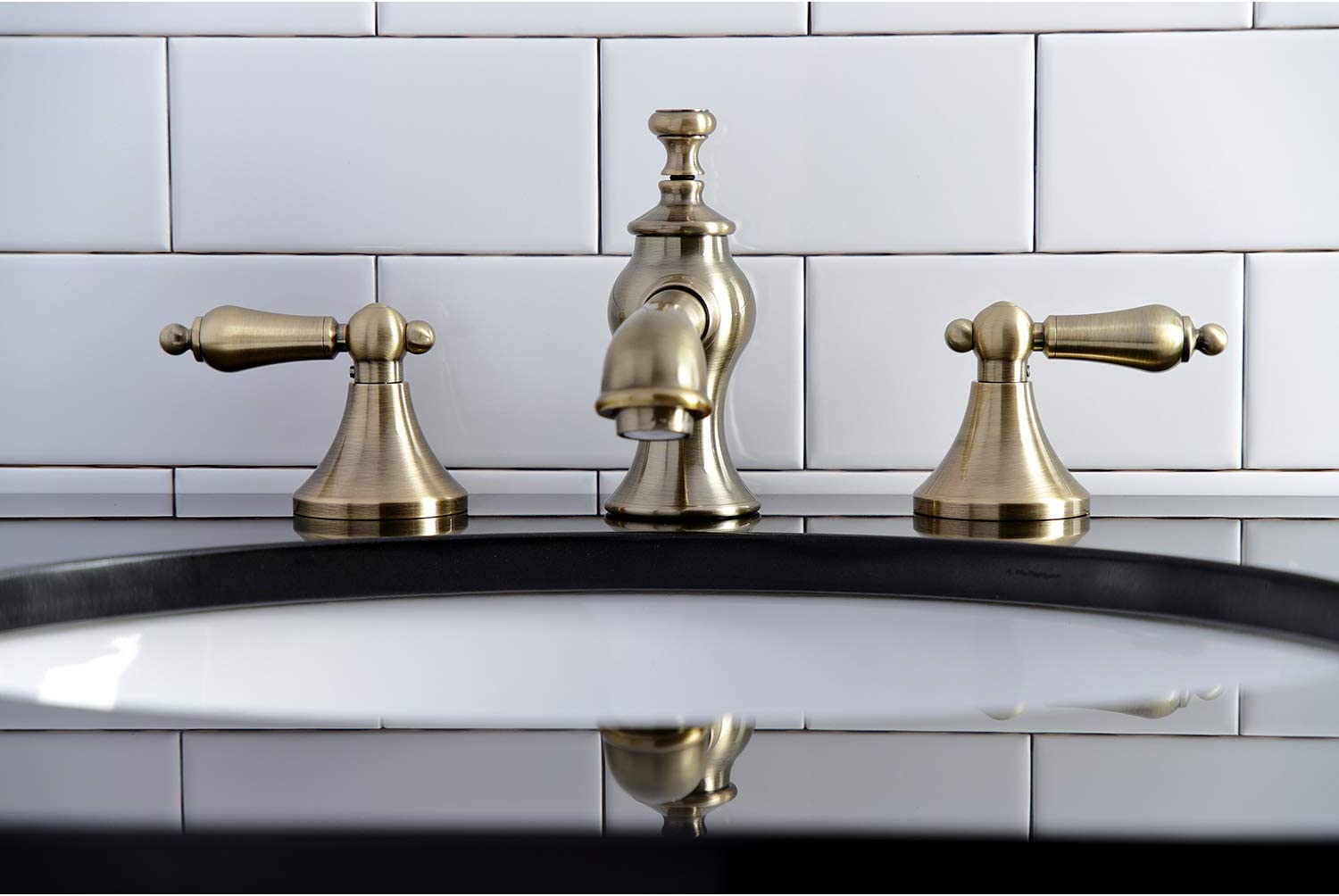 Kingston Brass KC7063AL Vintage 8 in. Widespread Bathroom Faucet, Antique Brass