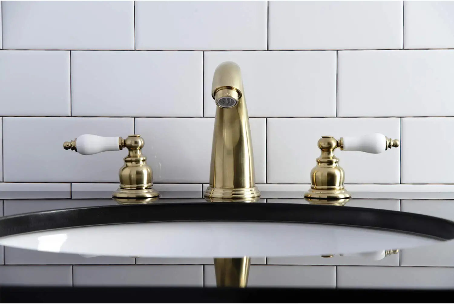 Kingston Brass KB987PLSB Victorian 2-Handle 8 in. Widespread Bathroom Faucet, Brushed Brass