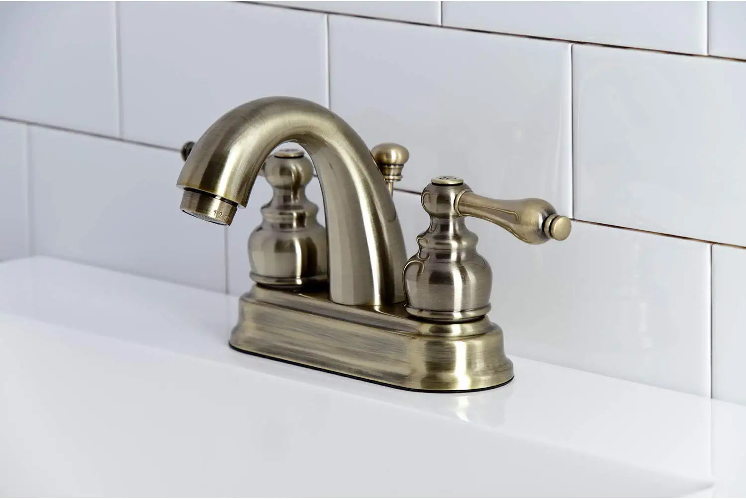 Kingston Brass KB5613AL Restoration 4-Inch Centerset Bathroom Faucet, Antique Brass