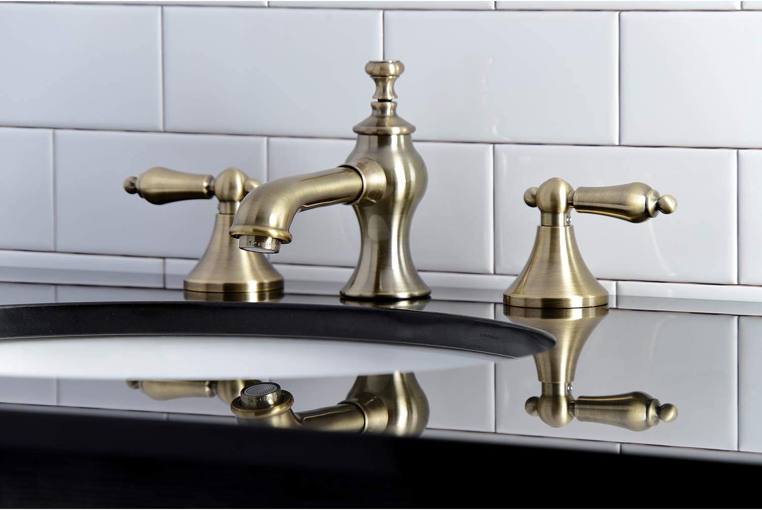 Kingston Brass KC7063AL Vintage 8 in. Widespread Bathroom Faucet, Antique Brass