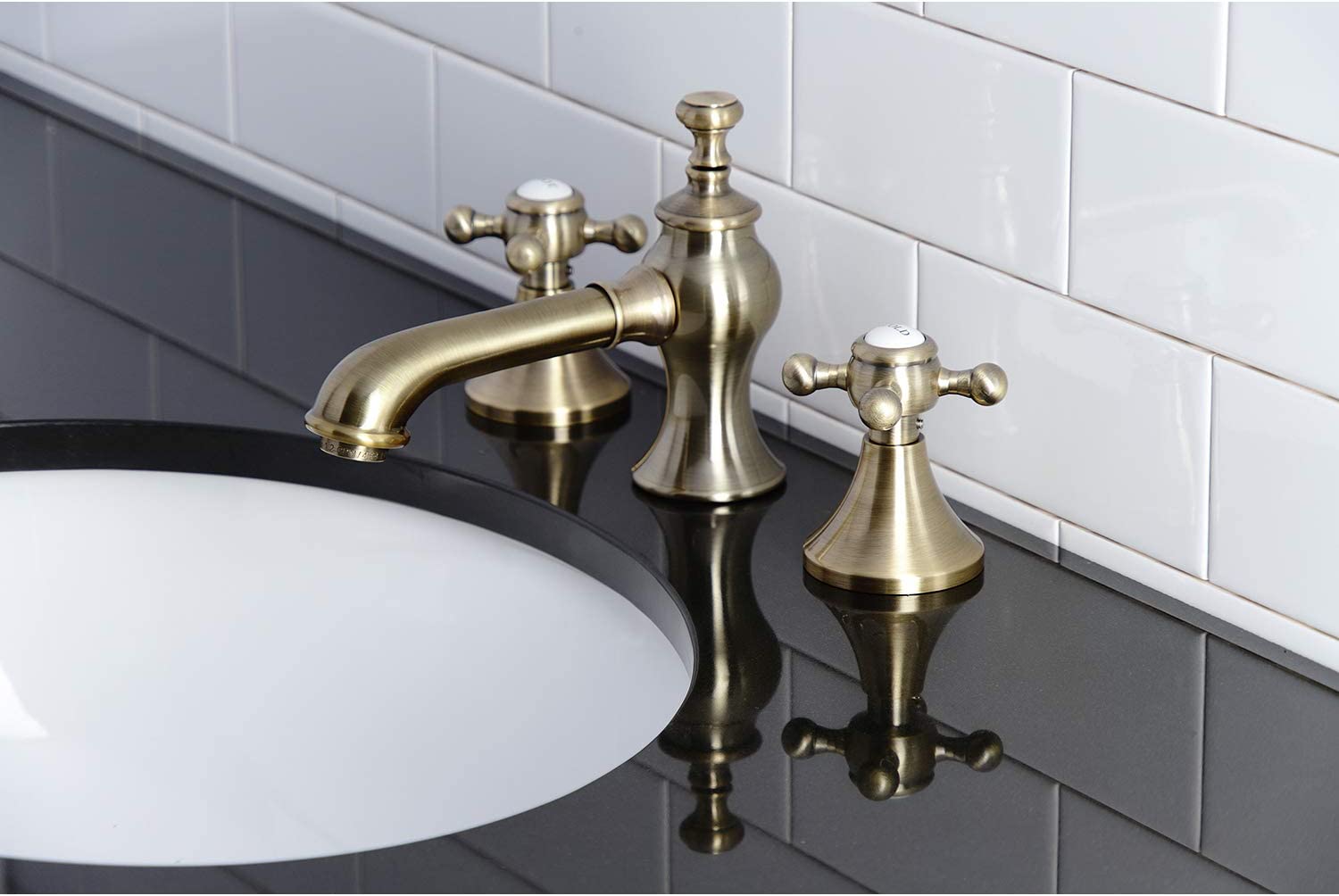 Kingston Brass KC7063BX English Country 8 in. Widespread Bathroom Faucet, Antique Brass