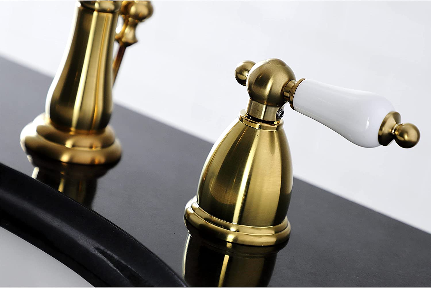 Kingston Brass KB1977PL 8 in. Widespread Bathroom Faucet, Brushed Brass