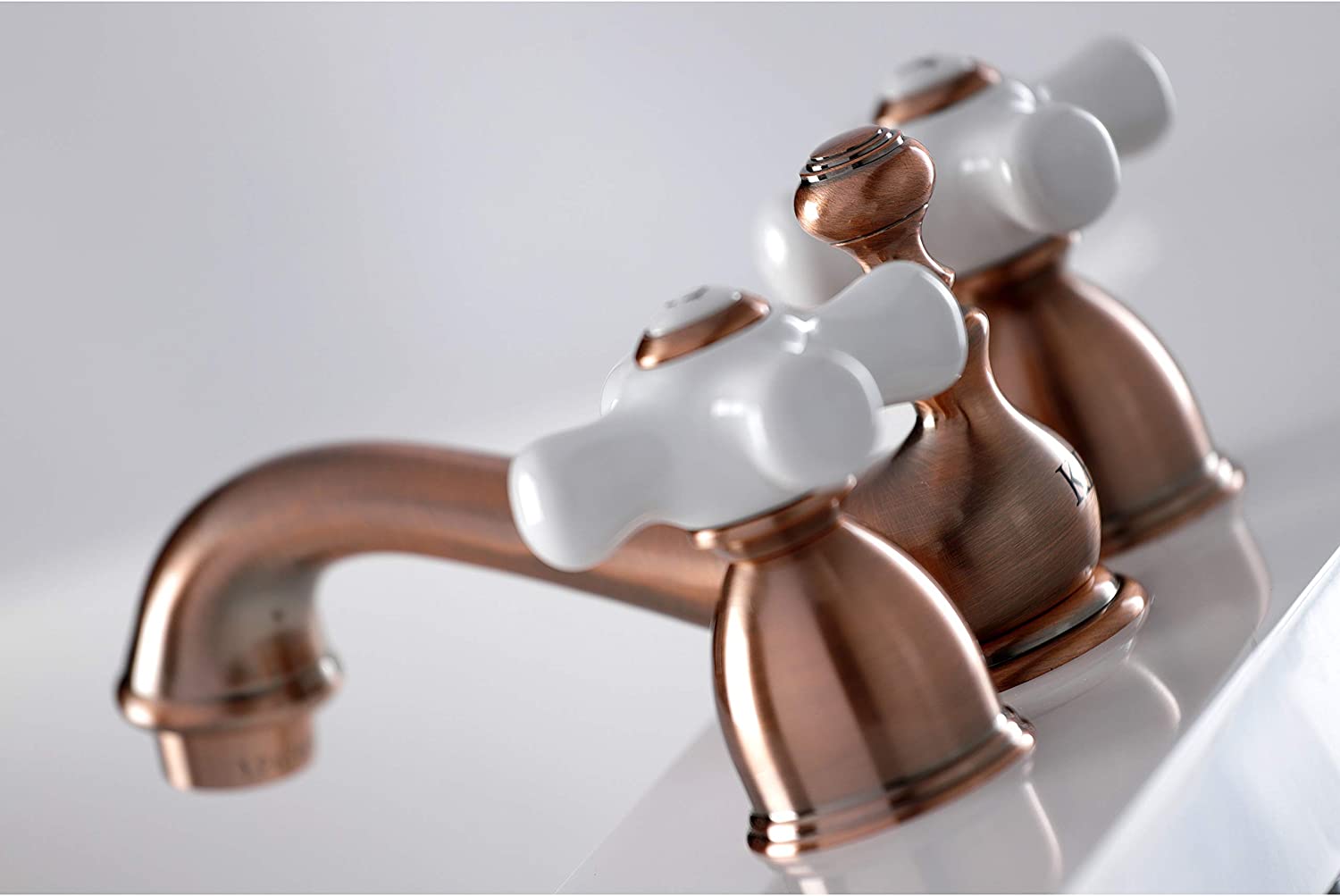 Kingston Brass KS395PXAC Restoration Mini-Widespread Bathroom Faucet, Antique Copper