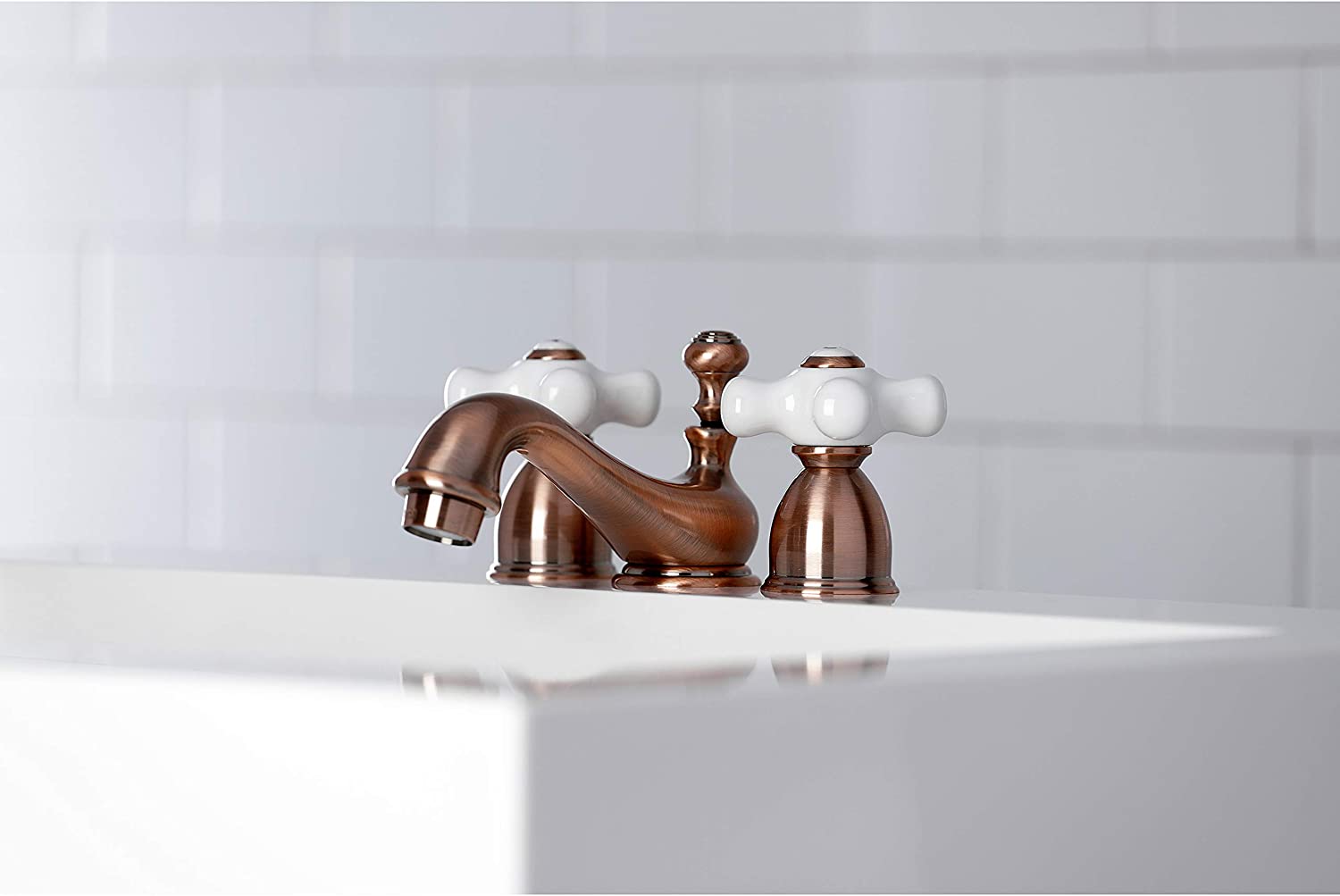 Kingston Brass KS395PXAC Restoration Mini-Widespread Bathroom Faucet, Antique Copper