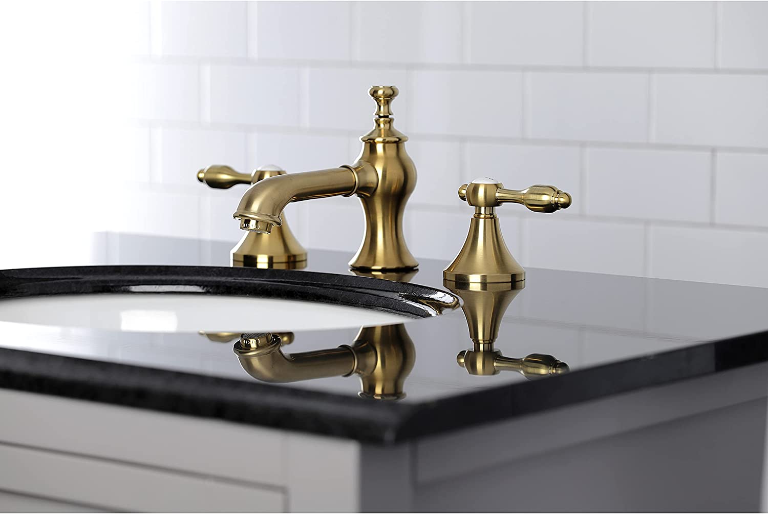 Kingston Brass KC7067TAL Tudor 8 in. Widespread Bathroom Faucet, Brushed Brass