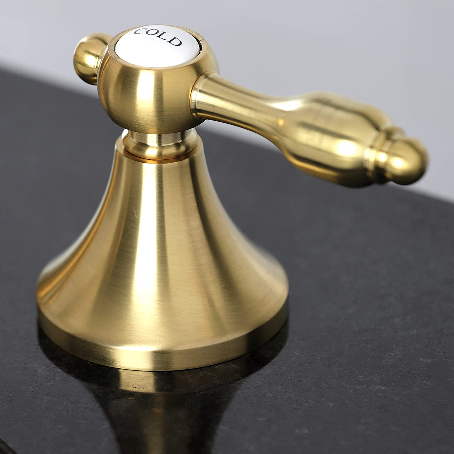 Kingston Brass KC7067TAL Tudor 8 in. Widespread Bathroom Faucet, Brushed Brass