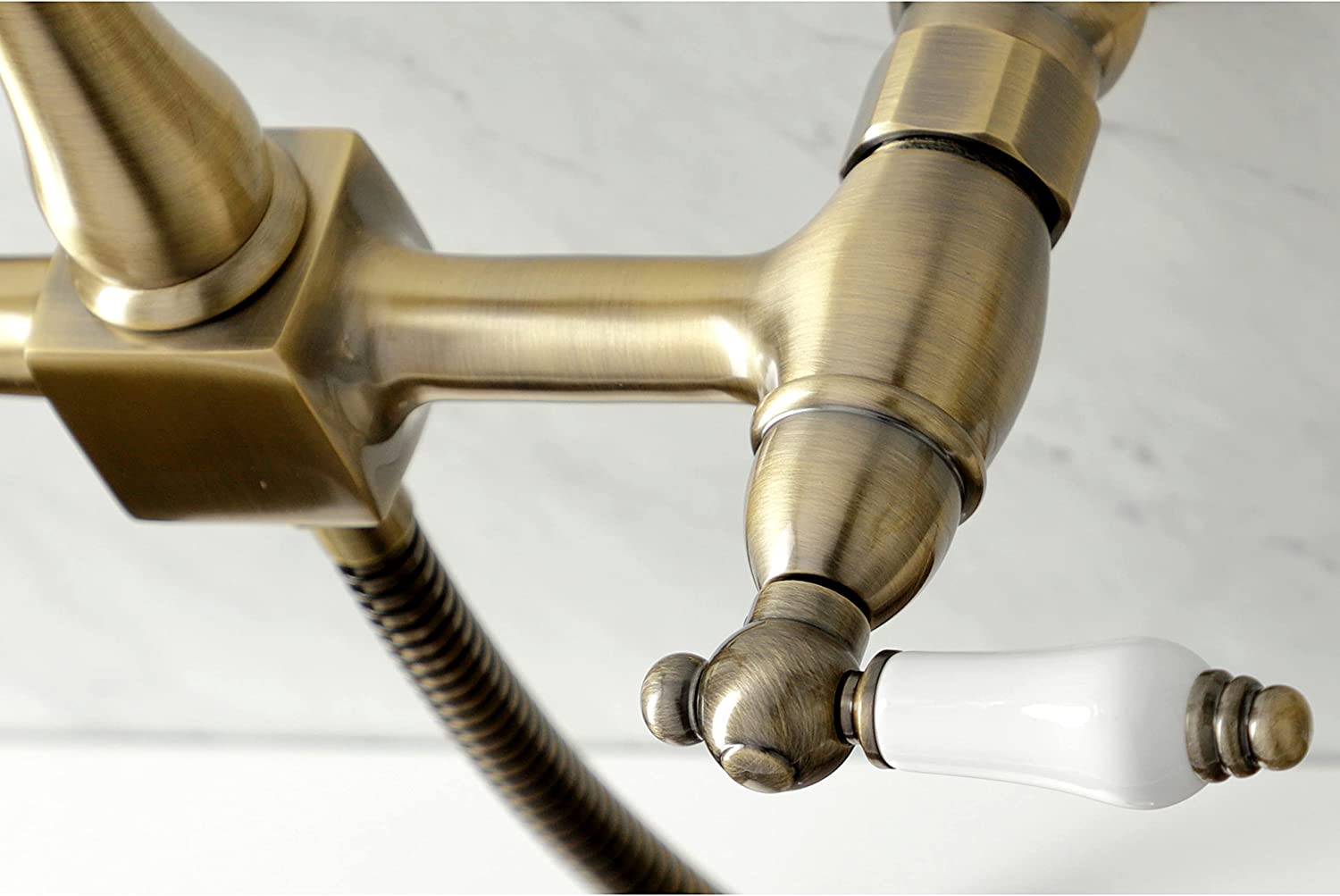 Kingston Brass KS1263PLBS Heritage Bridge Kitchen Faucet, Antique Brass