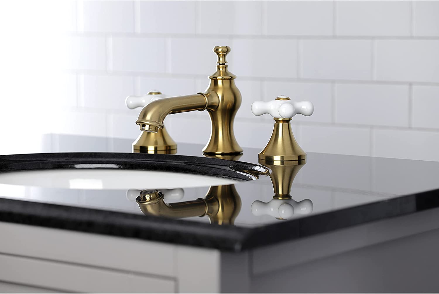 Kingston Brass KC7067PX Vintage 8 in. Widespread Bathroom Faucet, Brushed Brass