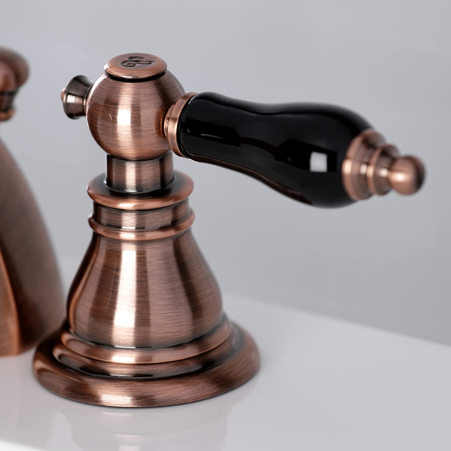 Kingston Brass KB956AKL Duchess Mini-Widespread Bathroom Faucet, Antique Copper