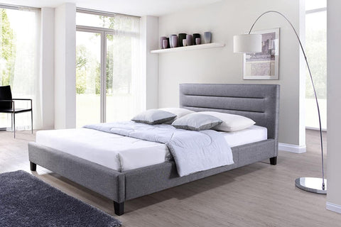 The Hillary Modern Fabric Platform Bed is inspired by simple forms and cleanliness to create a minimalist feel. From the simple two gaps created by the lines tufting effects` the grey upholstered fabric strive to combine great design with practical every