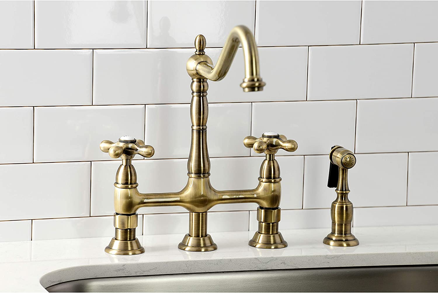 Kingston Brass KS1273AXBS Heritage 8-Inch Kitchen Bridge Faucet with Brass Sprayer, Antique Brass, 8-3/4-Inch