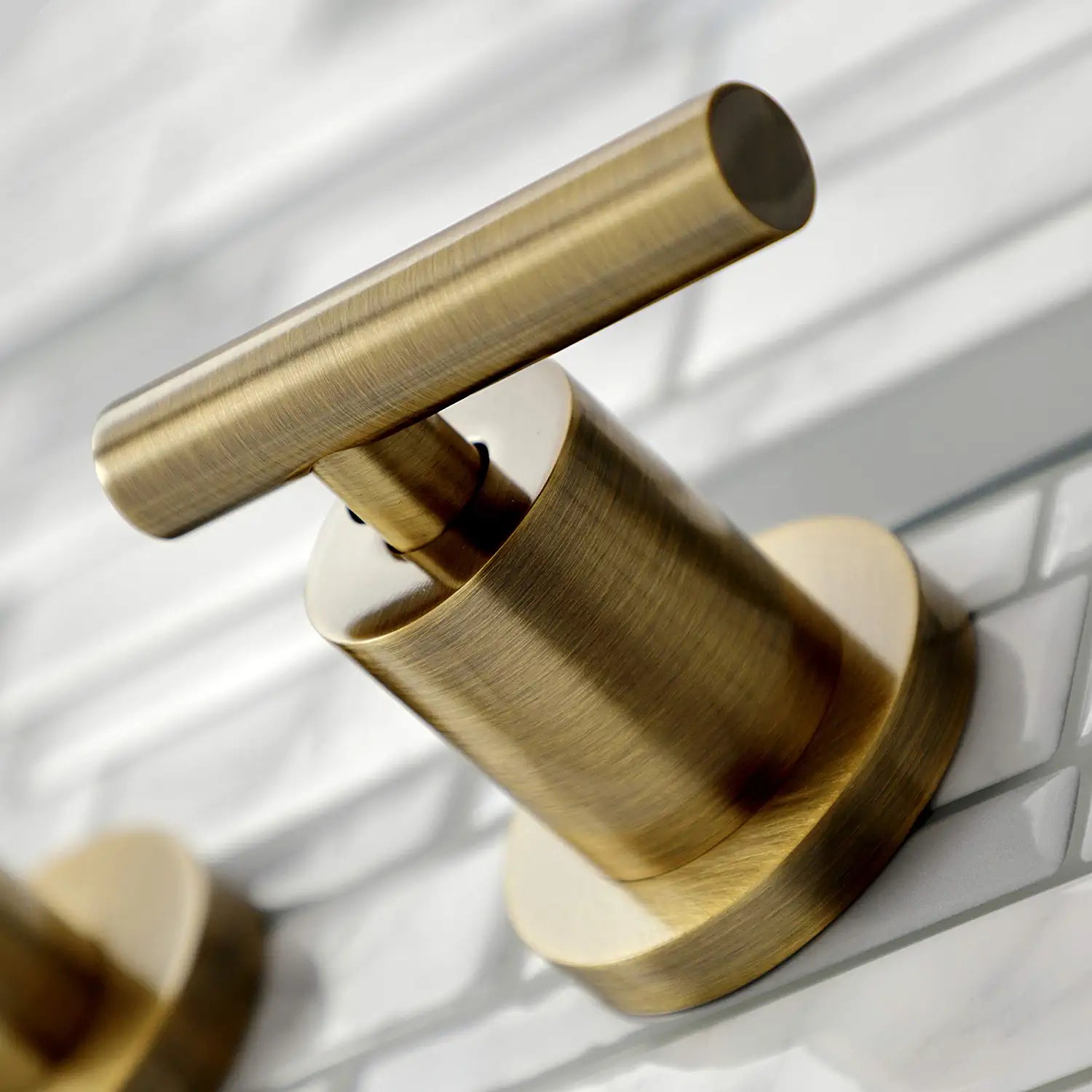 Kingston Brass KS8023CML Manhattan Tub Faucet, Antique Brass