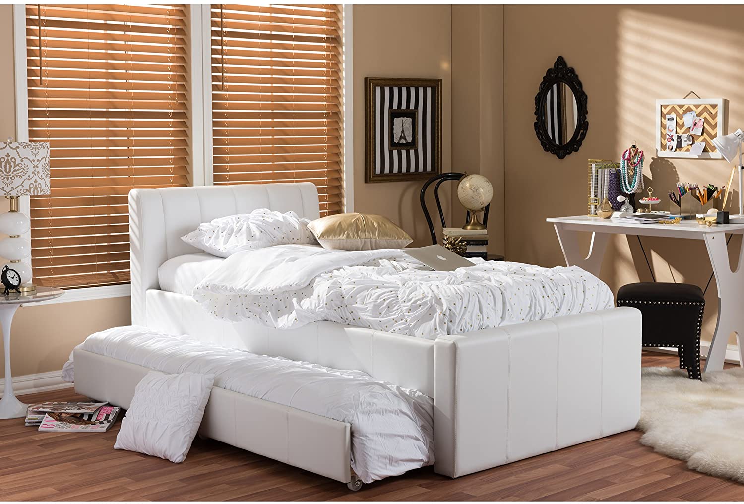 When space is at a premium why not consider investing in one of our uniquely practical guest beds` a twin size bed with a fabulous concealed trundle bed that sits neatly under the main bed` on castors for ease of maneuvering and framed in the same luscio