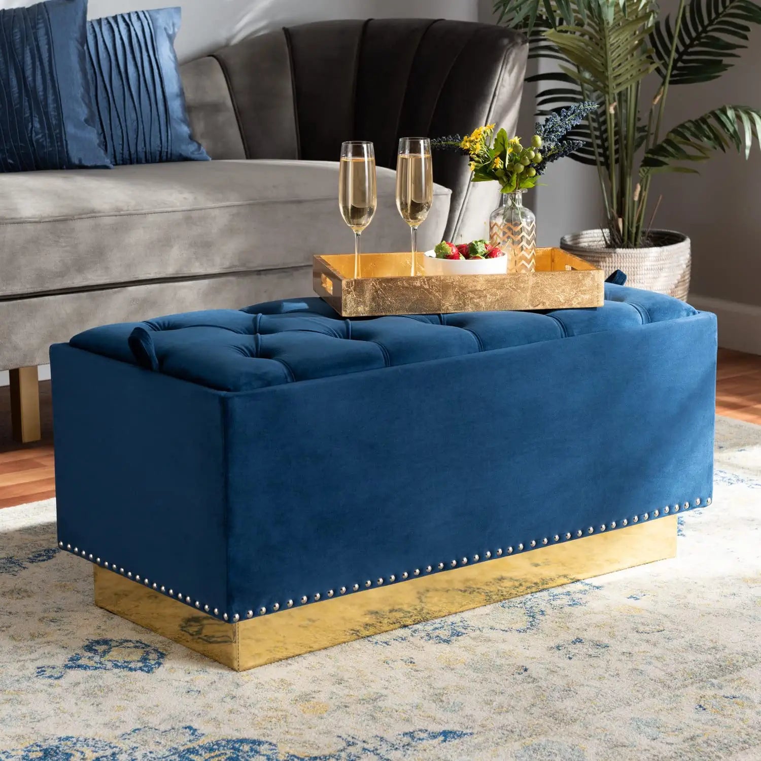 Baxton Studio Powell Glam and Luxe Navy Blue Velvet Fabric Upholstered and Gold PU Leather Storage Ottoman