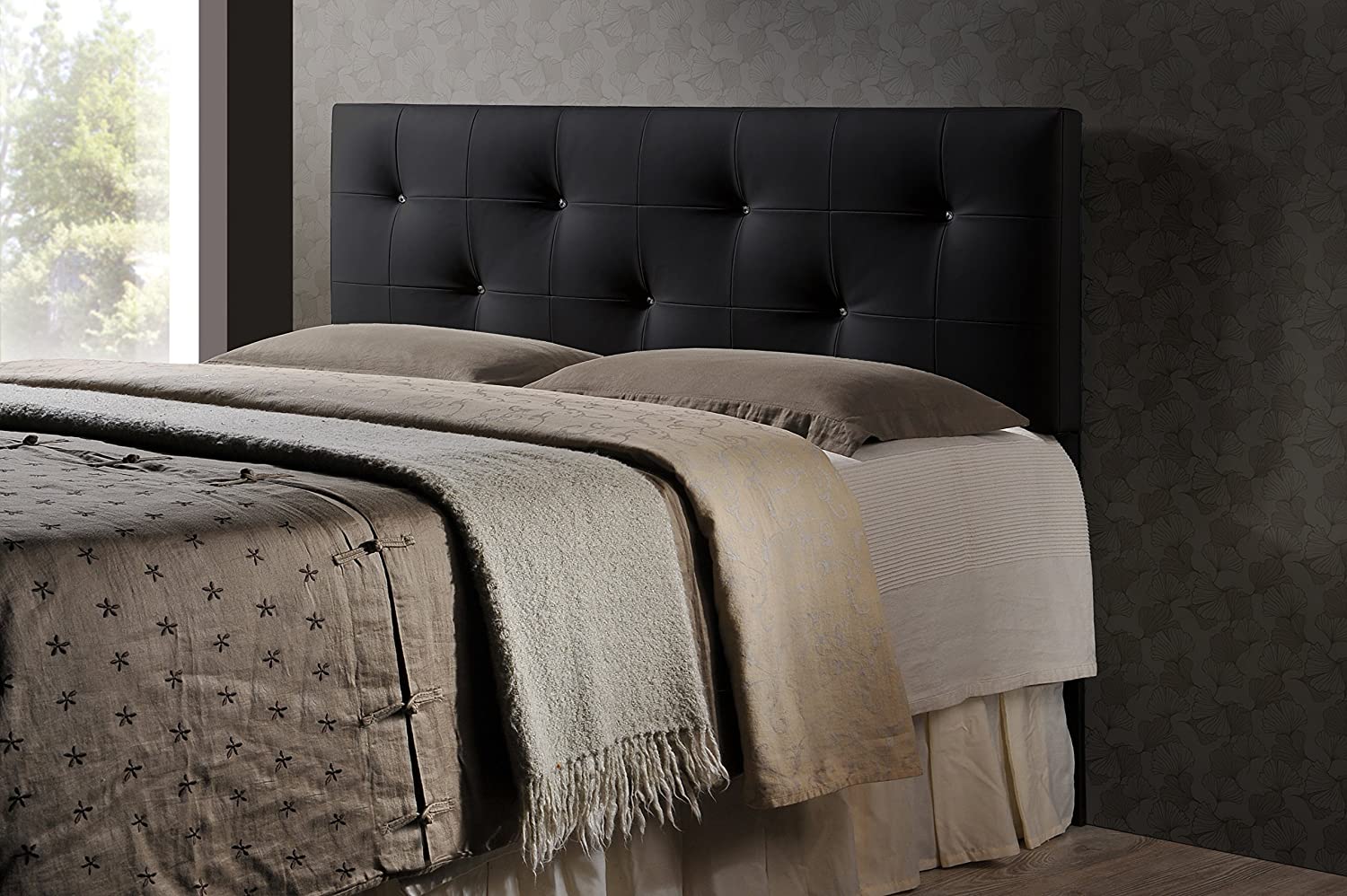 The Dalini faux leather tufted headboard demonstrates contemporary inspired design` with fresh stylish appeal. This padded faux leather headboard in white features a classic design` an ideal way to jazz up your current bedroom decor. The Dalini Headboard